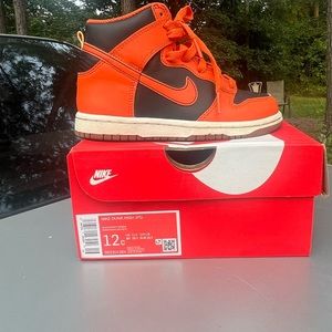 Orange and black Nike dunk high